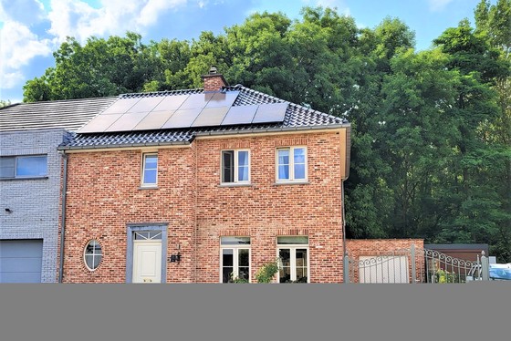 Prachtige pastorijwoning op 332m² met mooi aangelegde tuin, terras en uitzicht op het bos. 