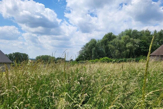 Prachtig gelegen bouwgrond voor open bebouwing op 923m² in het hartje van de Vlaamse Ardennen met panoramisch uitzicht op de velden.