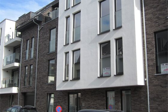 Prachtig nieuwbouwappartement v 102m² gelegen op de 1ste verdieping met lift en ruim zonnig terras van 13m².